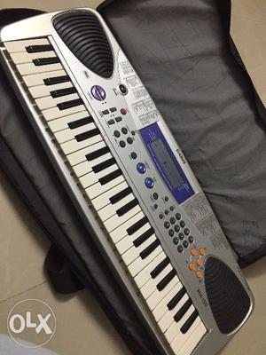 Brand new Casio with adapter and cover