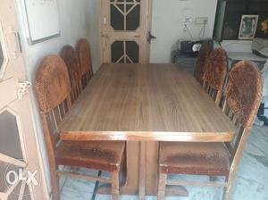 Dining table (6 seater) original price in market
