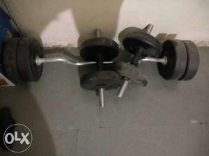Gray Barbell And Pair Of Dumbbells