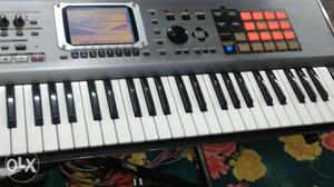 Gray Electronic Keyboard With Stand