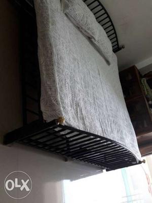 Nice iron double bed.4 years old. It has enough