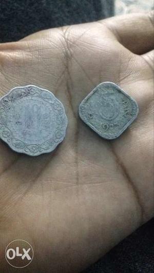 Old 5 and 10 paise coins.
