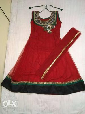 Red colour anarkali suit with net dupatta, only 2