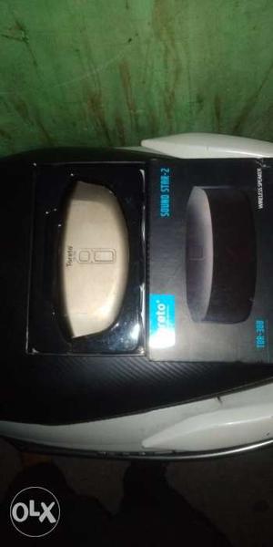 Round Beige Electronic Device With Box