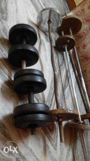 Two Dumbbells And Three Barbells