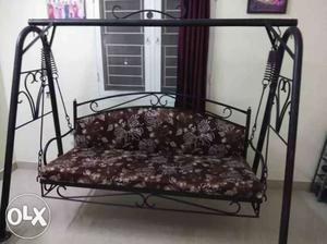 Black Metal Frame Purple And White Floral Padded Swing Chair