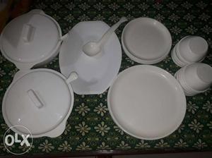 Complete and unused new dinner set for sale.