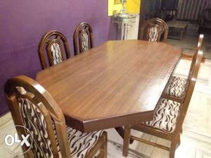 I sell my dinning set it's make in 100% sism wood.