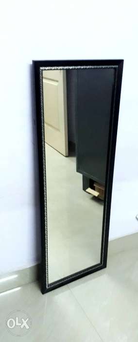 Tall, free standing mirror in excellent condition