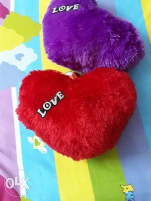 Two big Purple And Red Heart Pillows..price negotiable