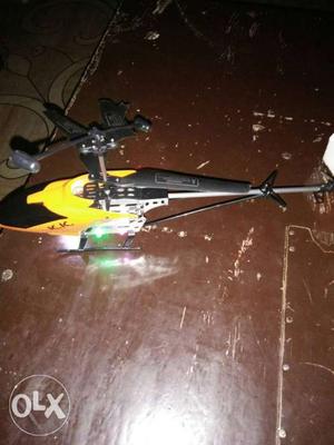 Yellow And Black R/C Helicopter