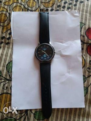 Black wrist watch with water resistance It's in
