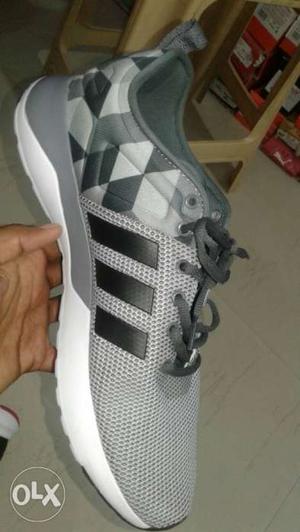 Gray And White Running Shoe