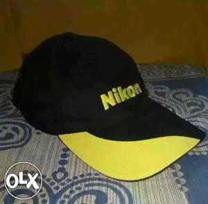 Original NIKON black and yellow Cap, just brought