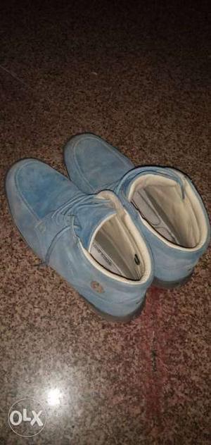 Pair Of Blue Leather Boots