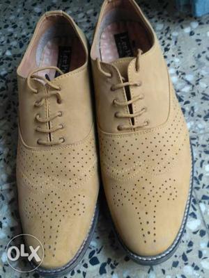 Pair Of Brown Leather Dress Shoes