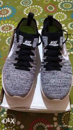 Pair Of Gray-and-black Nike Running Shoes
