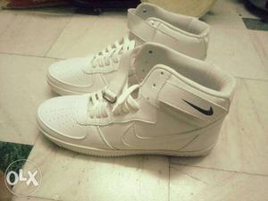 Pair Of White NIKE High-top Sneakers