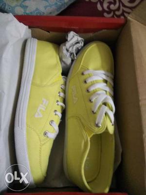 Pair Of Yellow Low-top Sneakers