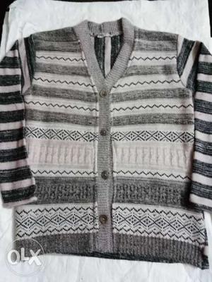 Baby soft wool cardigan. Price one forty ruppes.