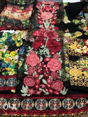 Black, Pink, And Green Floral Textile