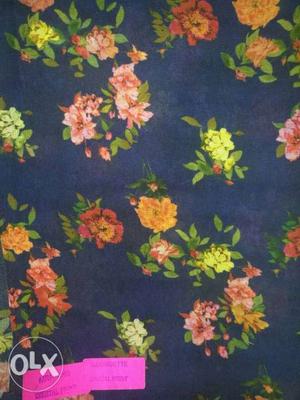 Blue, Yellow, And Green Floral Textile