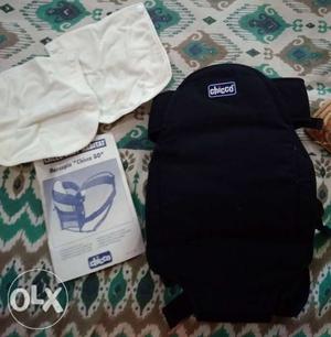 Chicco baby carrier. Never used. comes with 2