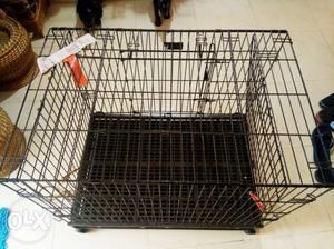 Dog Cage. 3 feet tall and 2.5 feet long. Made of