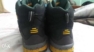 Pair Of Black-and-yellow DeWALT(german) all terrain Shoes