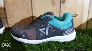 Pair Of Gray-and-teal Running Shoes