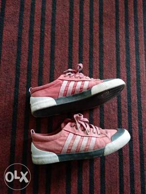 Pair Of Pink-and-white Sneakers