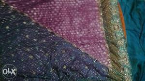 Purple, Green, And White Textile