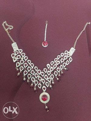 Red stone Necklace and many tika