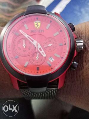Round Red Chronograph Watch With Black Strap