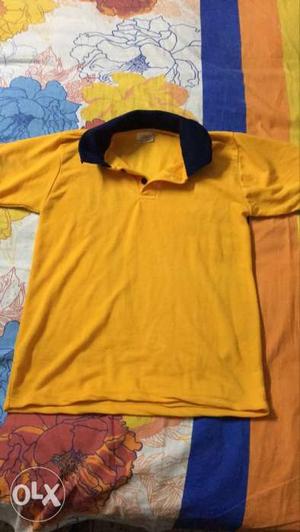 Yellow shirt with blue coller of size  cm)