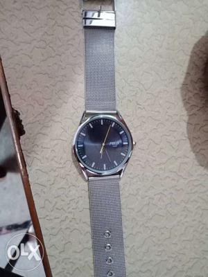 Felix watch with silver color fully policed..