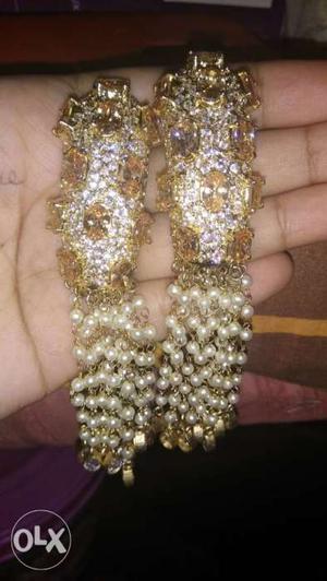 Gold-colored Dangling Earrings With Gemstones