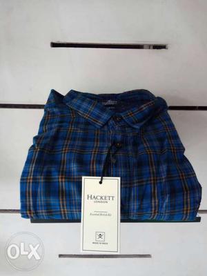 Mixed branded check and plain shirts. total 100