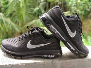 Pair Of Black Nike Air Max Shoes