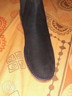 Pair Of Black Suede Slip-on Shoes