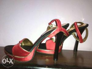 Pair Of Black-and-red Leather Sandals