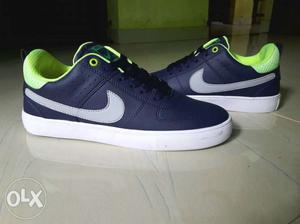 Pair Of Blue NIKE Sneakers