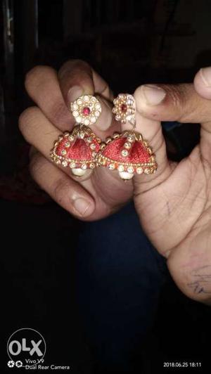 Pair Of Gold-colored And Red Silk Thread Jhumka Earrings