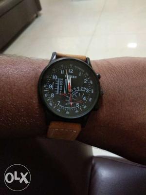Round Black Chronograph Watch With Brown Leather Strap