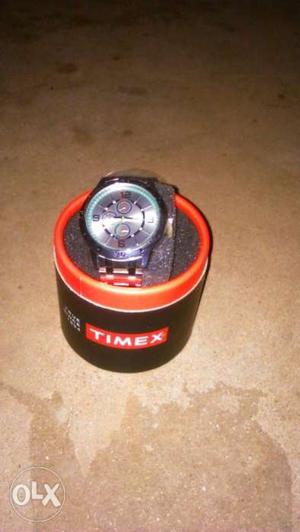 Round Silver-colored TIMEX Chronograph Watch With Case