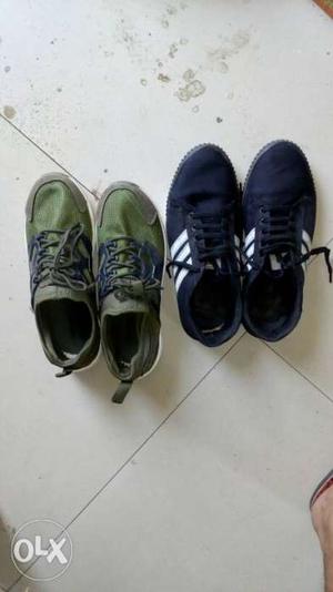 Two Pairs Of Black And Green Shoes