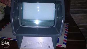 A vintage Slide Manual Slide viewer in working condition