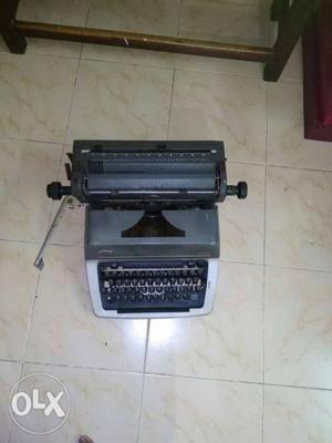 Antique typewriter with old keyboard, interested