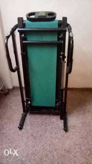 Black And Green Folding Treadmill