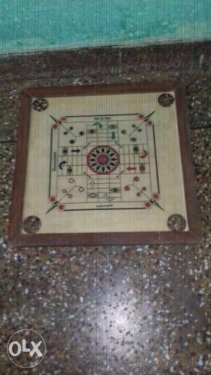 Brown And Red Carom Board